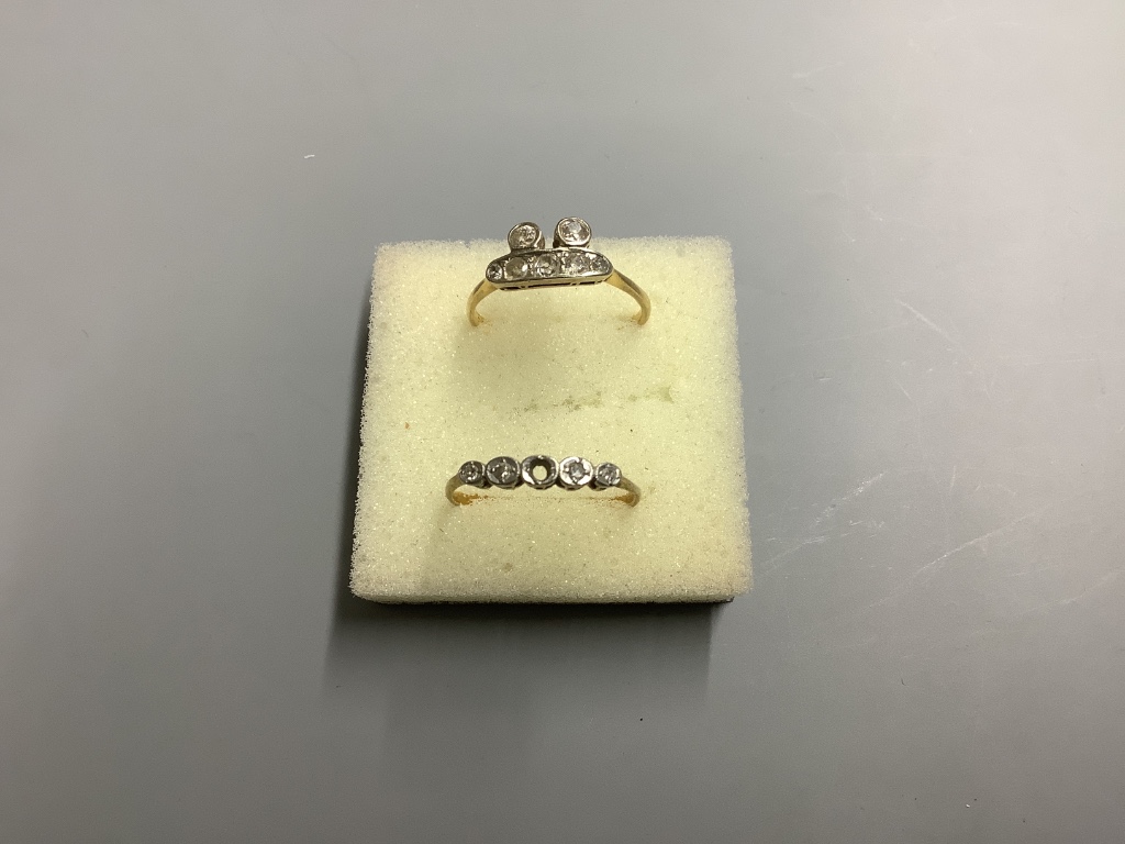 Three assorted 18ct and diamond set dress rings, gross 7.2 grams